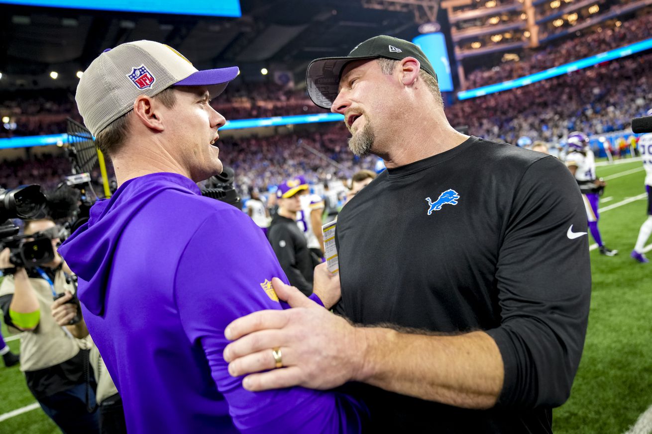 Head coach Kevin O’Connell of the Minnesota Vikings and head coach Dan Campbell of the Detroit Lions embrace after the game at Ford Field on January 07, 2024 in Detroit, Michigan.